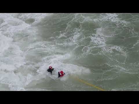 Fishing boat recovery attempts,Jersey shore island beach Nj 10/9/21