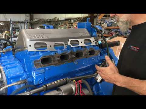 Detroit diesel 2 stroke exhaust manifold installation and stud replacement.