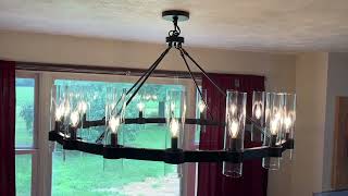 AEULYTIR 48 Inch Black Wagon Wheel Chandelier, Ideal for Dining Room, Kitchen, Entryways Review