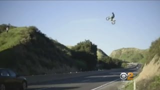 Dangerous Stunt - Video Shows Man On Dirt Bike Flying Over Freeway In Moreno Valley