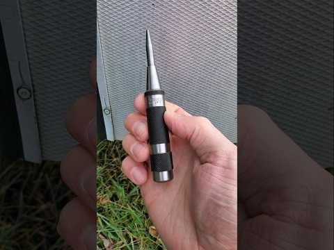 Starrett 18C Automatic Center Punch on metal, USA tool
