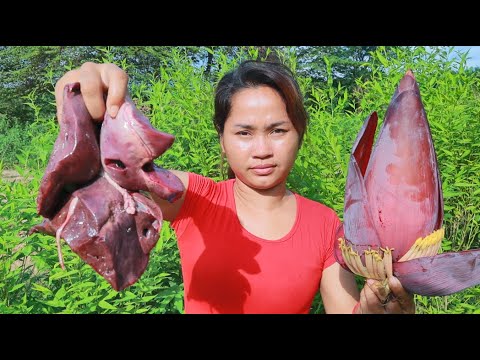 Yummy woman found pig liver with banana flower for cook -  eating  delicious
