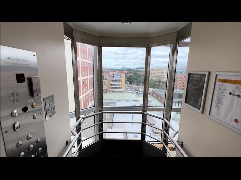 1986 KONE (mod. by: WPM Hisservice AB) Traction Scenic Elevators @ Solna Torg 19, Solna, Sweden.