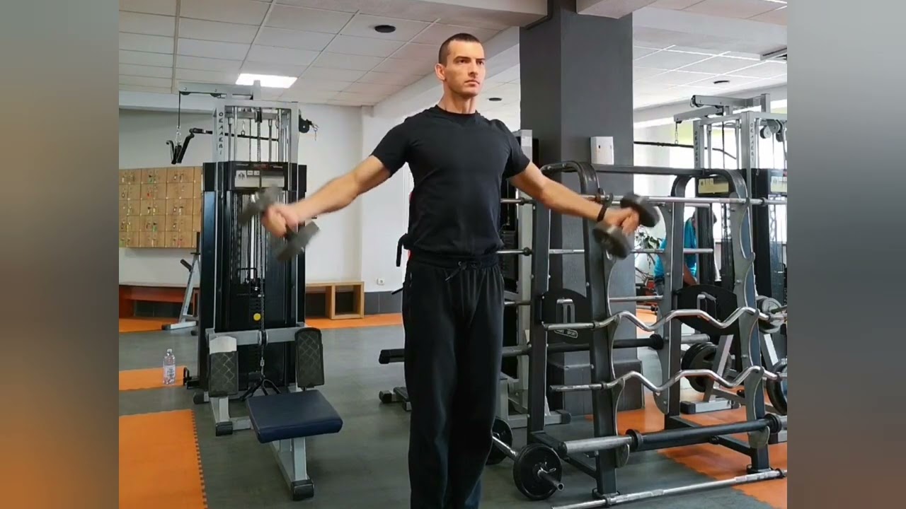 Ridicări laterale cu priză neutră, din stând, cu gantere