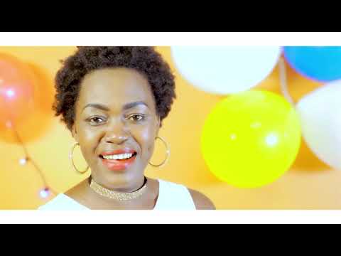 MERRY CHRISTMAS OFFICIAL VIDEO. By Faith Robinah Kabugo