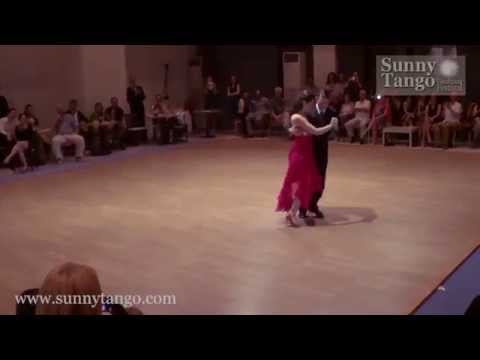  Vaggelis Hatzopoulos  and  Marianna Koutandou  are  dancing  to  a  milonga  by  Osvaldo Pugliese  at  Sunny Tango Festival  in  2014