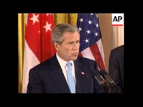 Bush signing Free Trade Agreement with Singapore PM