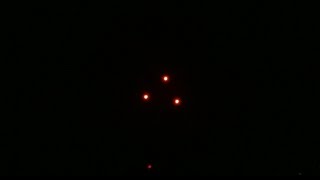3 orange red UFOs appear in triangle formation