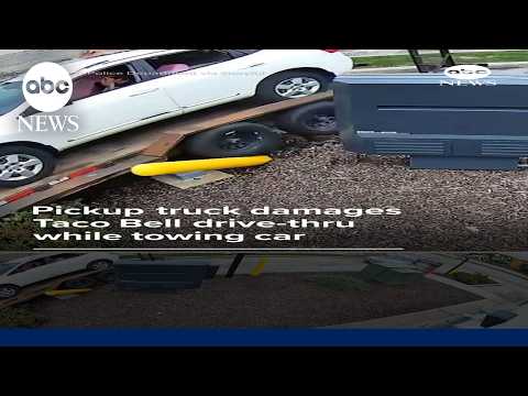 Pickup truck damages Taco Bell drive-thru while towing car