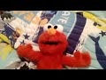 Elmo Sings Right In The Middle Of The Face