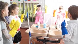 Group A singing Let's Clean Up song