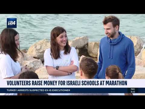 MITF Fellows run the TLV Marathon and raise money to buy English books and games for their school!