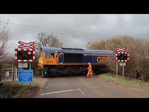 GBRf 66728 crosses Foxton Road Level Crossing with Barrington empties