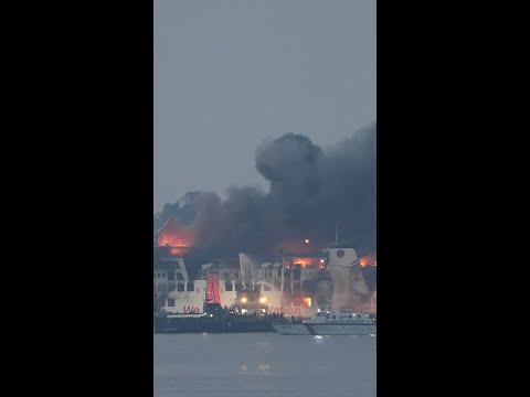 Rescuers evacuate passengers amid Indonesia ferry fire