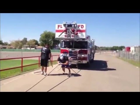 Strongman Truck Pull by Brian Shaw Pulling an 80,000 LB Fire Engine With Harness