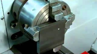 dialing work off center in a lathe using a 4-jaw chuck