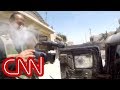 Cameraman narrowly survives sniper shot