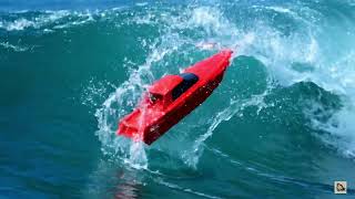 Scarlet RC Speedboat Flips Over Giant Wave in Slow Motion
