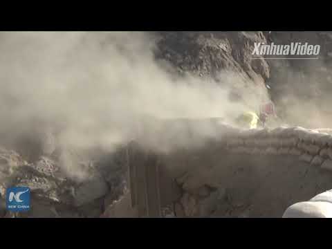 Chinese army recruit drops live grenade, saved by instructor