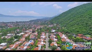 preview picture of video 'Aerial: Downtown Ajijic Mexico (Church, Plaza, Mountains & Lake)'