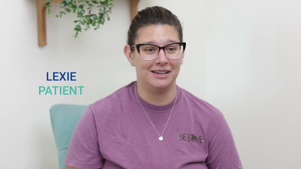 Spring Hill dental team member talking to a patient