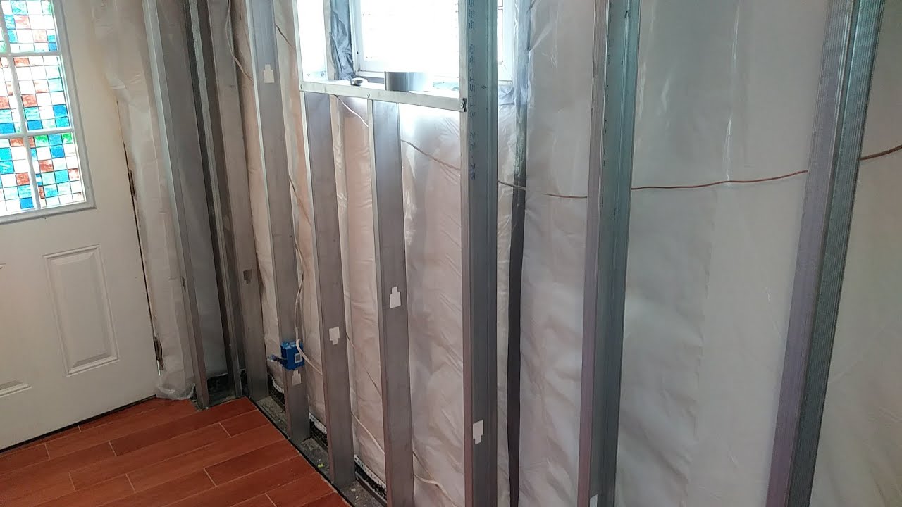 How to install a waterproof vapor barrier before finishing your basement walls