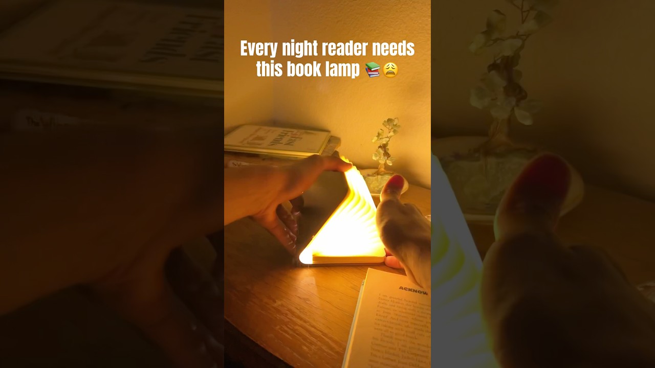 Illuminate your space with this stunning book-shaped lamp! #books #booktube #booktok #booklamp #wow