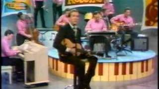 Marty Robbins Sings 'Back Home Again.'