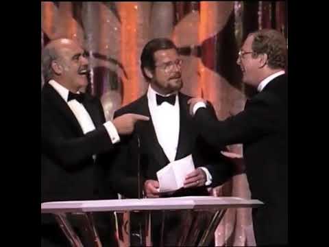 Sean Connery with Michael Caine and Roger Moore. Presenting Best Actor Oscar at 1989 Academy Awards.