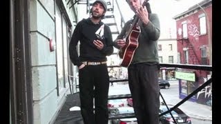 Patrick Watson performs Words In The Fire on a fire escape in Montreal