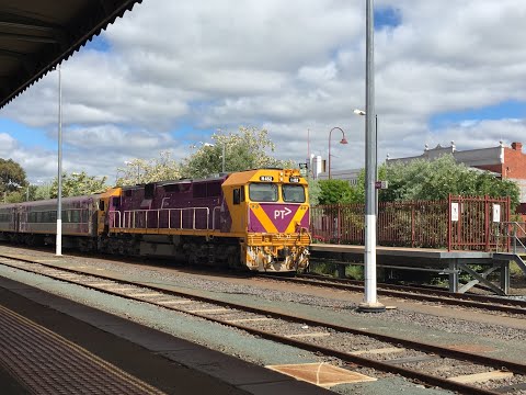 N class with Baggage carriage passes wallan station after leaving albury