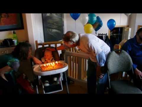 1st Birthday song, cake and candles!