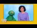 Dr Nicole Clark With Sesame Street Muppet Rosita In Spanish