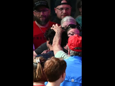 Protester grabbed by audience member at Texas Trump rally