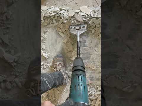 Removing tile with a Makita Demolition hammer and tile removal bit