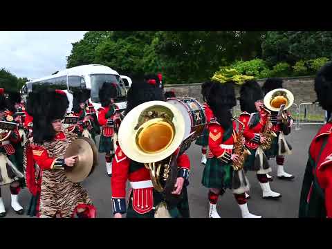 The Royal Regiment of Scotland march into Holyrood Palace to welcome the King and Queen