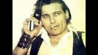 Outlaw Shit by Waylon Jennings from his Waylon Forever album.