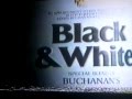 Black White Scotch Whisky Advertisement