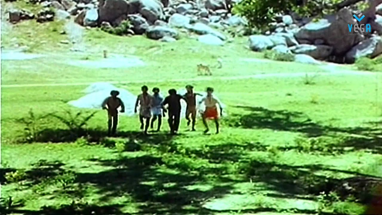 Nadu Nalla Nadu Song Lyrics | Rasigan Oru Rasigai