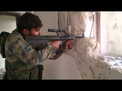 اشتباكات بين عناصر لواء أمجاد الإسلام وقوات النظام في خان العسل