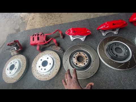 Brake caliper side-by-side comparison: OEM 2 piston vs 4 piston Brembo vs 6 piston