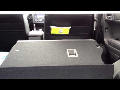 Abatir asientos con botón