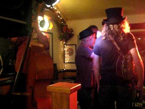 Them Harvey Boys Exchange Hats in the Cidershed.