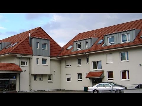 Gepflegte 4-Zimmer-Wohnung mit Balkon und Tiefgaragenstellplatz in Langensteinbach, provisions