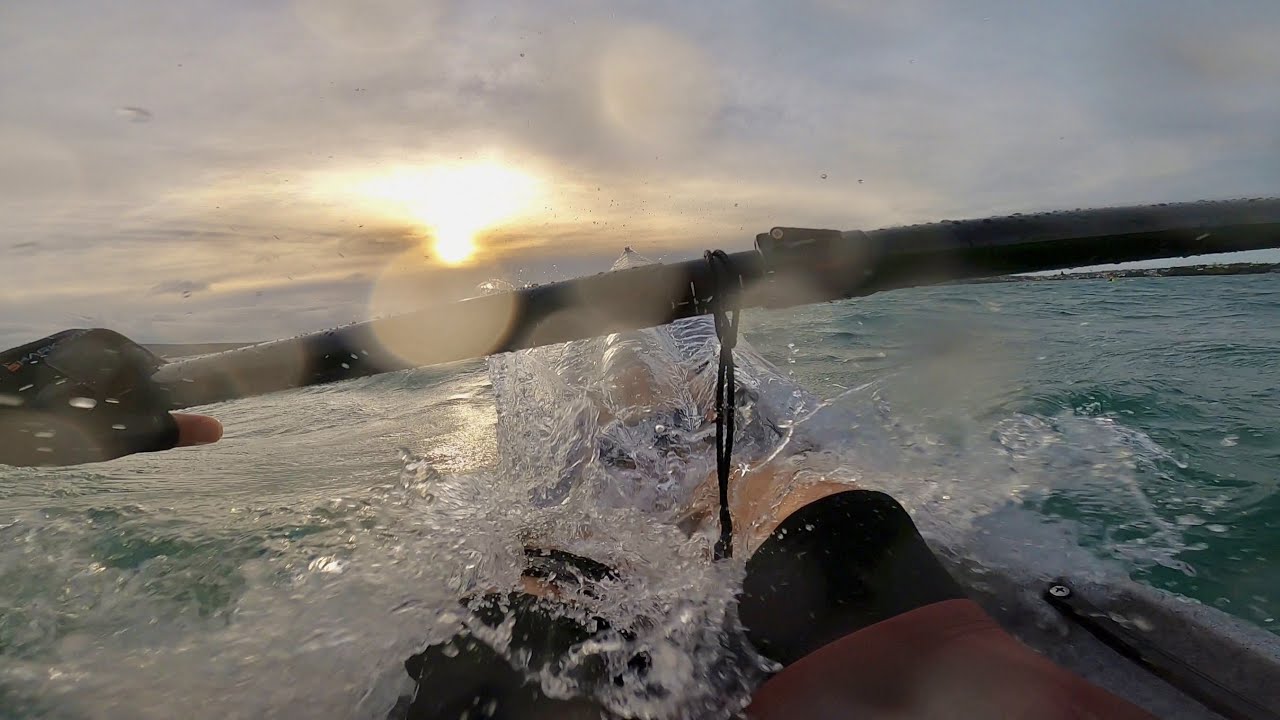 Paddling into strong headwinds and waves! Epic surfski V7