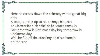 Buck Owens - Tomorrow Is Christmas Day Lyrics