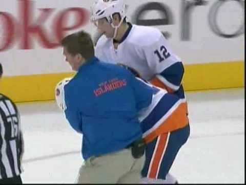 Mike Mottau nailed in the face by a wrist shot