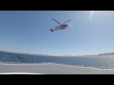 Coast Guard aircrew medevac passenger from Alaska ferry Kennicott in Shelikof Strait