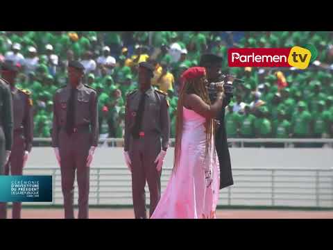 Black M and Sia Tolno sing the Guinean national anthem; Inauguration ceremony