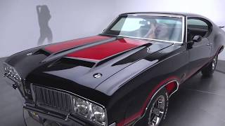 Long Cool Woman in a black dress